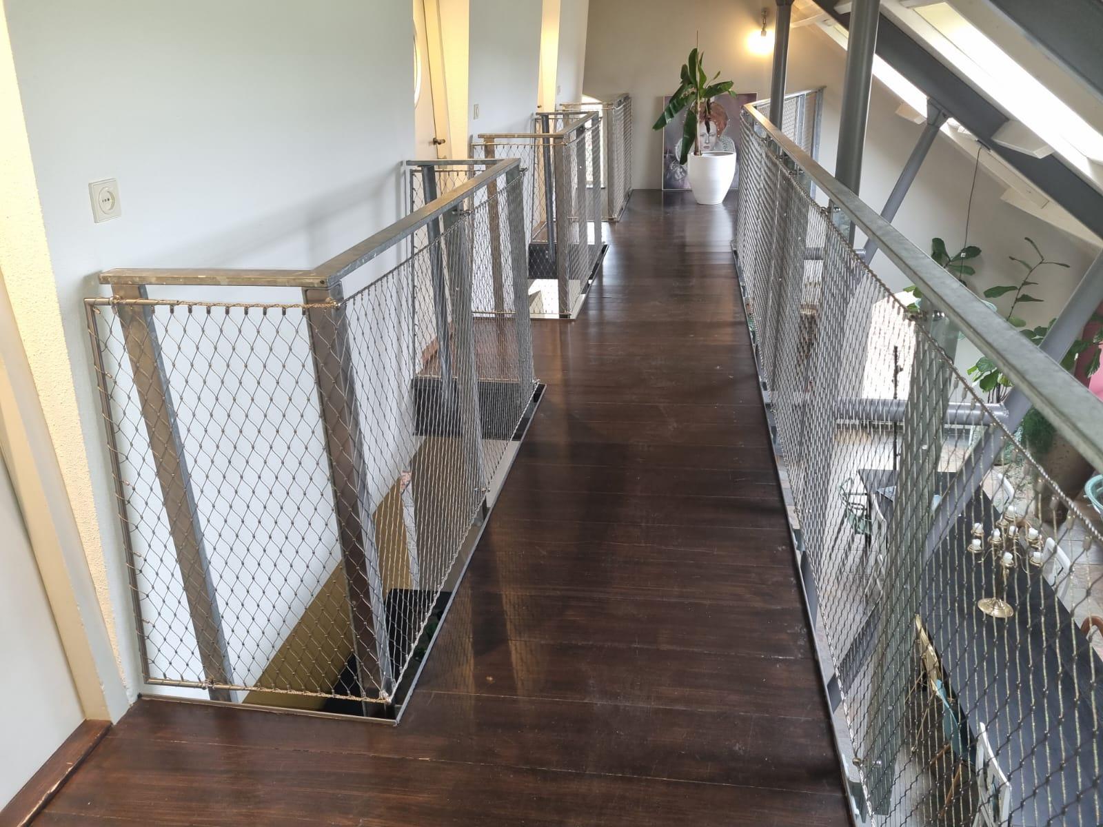 Woonboerderij staalkabelnetten transparantie